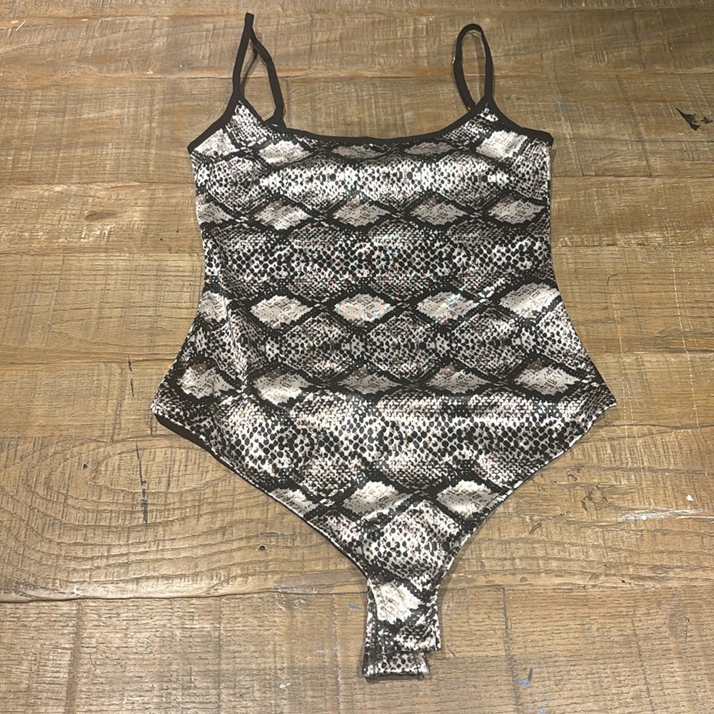 NWT Free People patterned thong back bodysuit